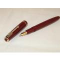 PARKER BURGUNDY SLIMFOLD FOUNTAIN PEN WITH 14K GOLD NIB AND MATCHING PENCIL