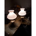 A VINTAGE PAIR OF ITALIAN? STYLED BRASS PLATE TABLE LAMPS WITH PALE PINK STUDENT GLASS LAMPSHADES