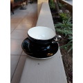RENOWNED CERAMICS ARTIST PETER MTHOMBENI SIGNED TEA CUP & SAUCER BLACK WITH CHROME RIMS. WOW!