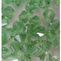 10 x Glass Bicone Beads, Light Green. 6mm x 5mm