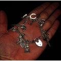 *CHARMS*WOW !HALLMARK STERLING SILVER CHARMS BRACELET WITH HEART PADLOCK CLASP !