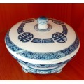 Oriental porcelain blue and white footed lid trinket box