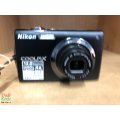 Nikon Coolpix S4000 12 MP Digital Camera with 4x Optical Vibration Reduction (VR) Zoom