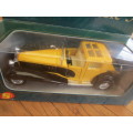 Yellow and Black heavy metal die cast car in original box model SS4717