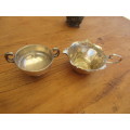 A TWIN HANDLED BOWL ( WALKER AND HALL) AND A CREAMER JUG SILVER PLATED