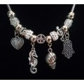 Boho Silver Charm Necklace with Hamsa , Seahorse ,  Heart & Shell Charms - White
