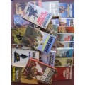 A LOT OF 23 PAPERBACK BOOKS BY LOUIS L`AMOUR.