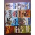 A LOT OF 23 PAPERBACK BOOKS BY LOUIS L`AMOUR.