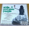 SANDI THOM Smile ... It Confuses People  [Shelf G Box 15]