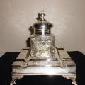 Large etched silver-plated inkstand with a central cut-glass inkwell with etched hinged lid