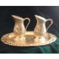 Stunning vintage embossed silverplate Dutch salt and pepper set with tray