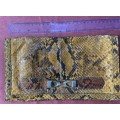 Vintage snakeskin envelope clutch / purse / bag.  There is room for mobile, keys and cosmetics