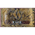 Vintage snakeskin envelope clutch / purse / bag.  There is room for mobile, keys and cosmetics