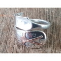 Golf ring. Two gold golf sticks on a sterling silver ring. Interesting design. 12.2 grammes