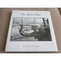 On Africa Time by Pierre Crocquet. WITH DUST JACKET. First Edition 2003 by Bell-Roberts Publishing.