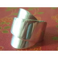 Stunning wrap around sterling silver ring.  12. 6 g . Marked 925