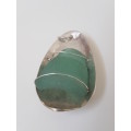 Smoky Seaglass in solid silver oval  setting with silver wire. 9.9  g!