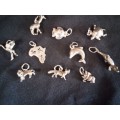 10 SILVER CHARM'S