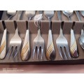Eetrite 18/ Stainless steel -goldplated teaspoons and cake forks