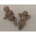 Two unknown figurines