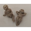 Two unknown figurines