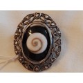 Vintage 925 silver brooch with black and white swirl