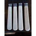 Four Aristo ivorine handle knifes