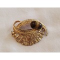 Tigers eye and gold tone brooch