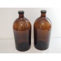 Two Brown 2.5 liters medicine bottles