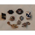 Mixed brooches, pin`s, pendants and other pieces
