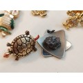 Mixed brooches, pin`s earrings and other pieces