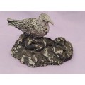 Made of Mt St. Helen`s Ash Bird on a rock