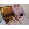 Jewelry Box with jewelry. Few broken pieces. NO silver/gold