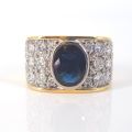 18CT YELLOW AND WHITE GOLD SAPPHIRE AND DIAMOND RING