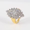 18CT YELLOW AND WHITE GOLD MARQUISE CLUSTER DIAMOND RING