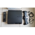 PS3 SLIM CONSOLE + 27 GAMES and ACCESSORIES