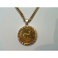 1981 - 1 Ounce Gold Krugerrand On a 14 Carats Gold Mounting With a 9 Carats Gold Chain in a S. M. Re