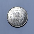 USA 1883 SILVER MORGAN DOLLAR. MINT STATE WITH BAG MARKS.