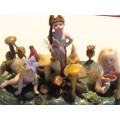 3 miniature fairy dolls in a mushroom garden (larger than 1:12" scale)