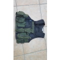 pre-1992 era SAP STF olive green urban assault vest with 2 x MP5 SMG mags ammo panel in good used co