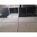 **LIQUIDATION STOCK**BULK LOT OF 4X  LAPTOPS LAPTOPS*POWERING ON BUT SOLD AS IS**
