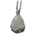 Natural tear-drop gemstone with intricate metal flower design