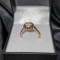 9ct Rose Gold 0.60ct Diamond Halo Ring - Evaluation R17 500
