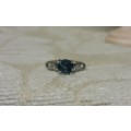 new gold listing~ stunning ladies 9ct white gold ring with blue stone and clear side stones