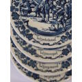 A COLLECTION OF 8 DUTCH DELFT BLUE AND WHITE WALL PLATES....16 CM X 16 CM EACH