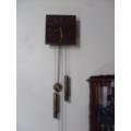 UNUSUAL VINTAGE HERMLE WALL CLOCK....WORKING.....HAS PENDULUM WEIGHTS CHAINS