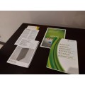 Xbox 360 Slim 250 GB with 2 controllers