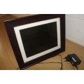 Coby 10.4 inch Digital Photo Frame (Wood). Scrolling picture frame for USB, SD, .jpg images.