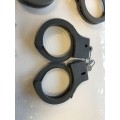 Pretend playing plastic hand cuffs - police playing x 2