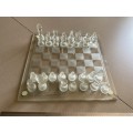 Glass chess board and pieces - see pics as some pieces has chips
